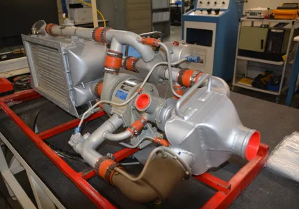 Overhauled air cycle machine assembly on a test stand